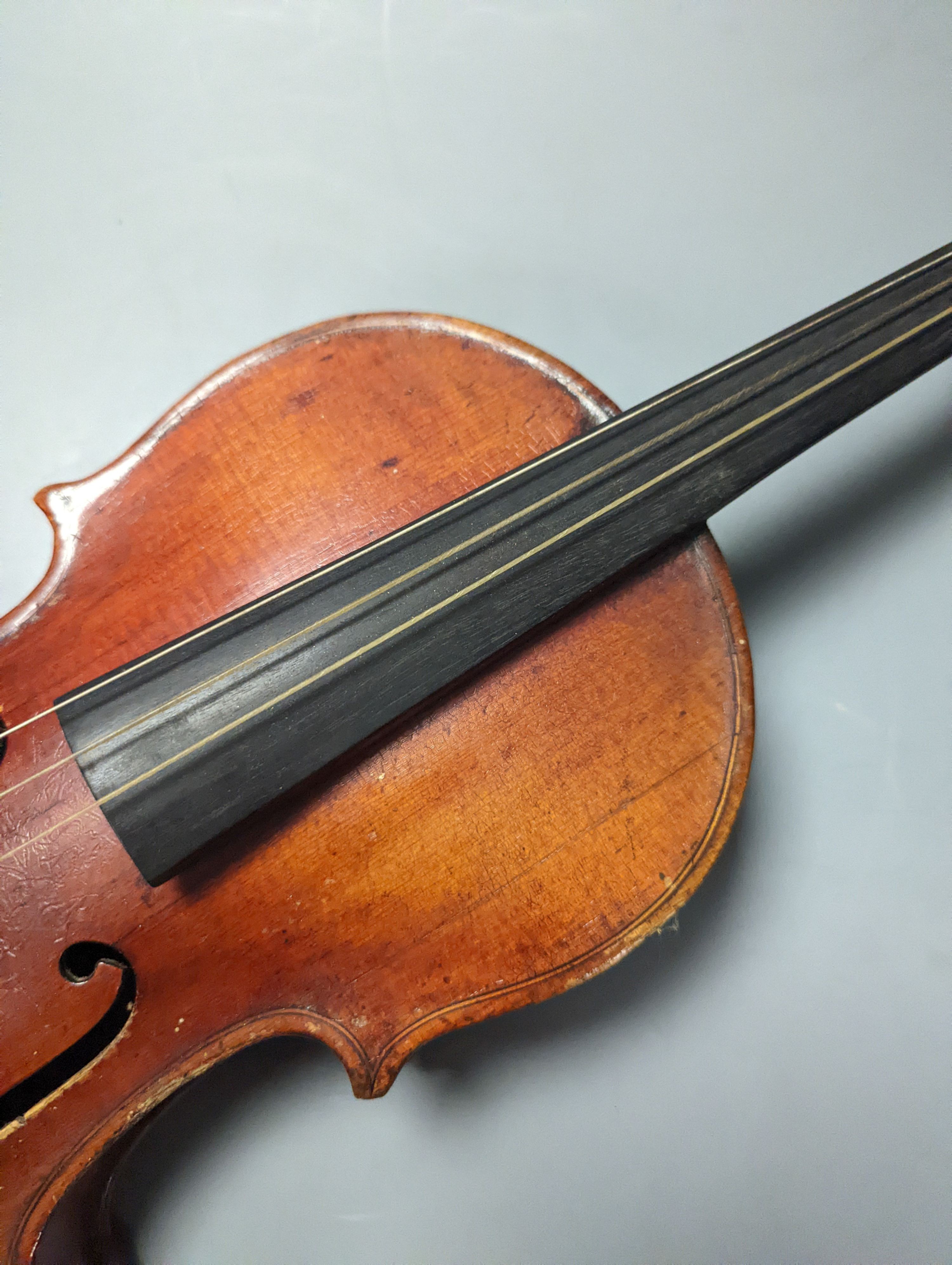 A violin in a mahogany case, case makers, Withers and sons, case 79 cms high.